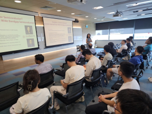 Professor Huili Grace Xing presenting her seminar on wide bandgap semiconductors to attendees at NSTIC (GaN).