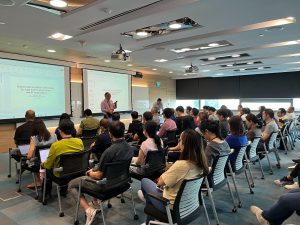 Audience attending Dr Han Wui Then’s seminar on GaN-on-Si technology for power and RF applications at NSTIC (GaN).