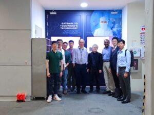 Group photo in front of NSTIC (GaN) entrance with Matsuda Sangyo guests.