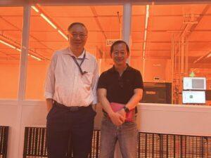Mr. Desmond Kok from ST Engineering and Prof Geok Ing Ng at the cleanroom lobby with R&D display.