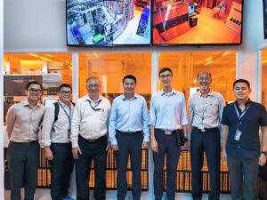 Group photo of MINDEF FSTD delegation with NSTIC (GaN) team during official visit to Singapore’s Gallium Nitride research facility.